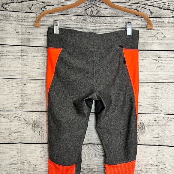 Under Armour Women's Legging Size Medium Gray/Corral Stretch Side Hem Zipper - Picture 8 of 10